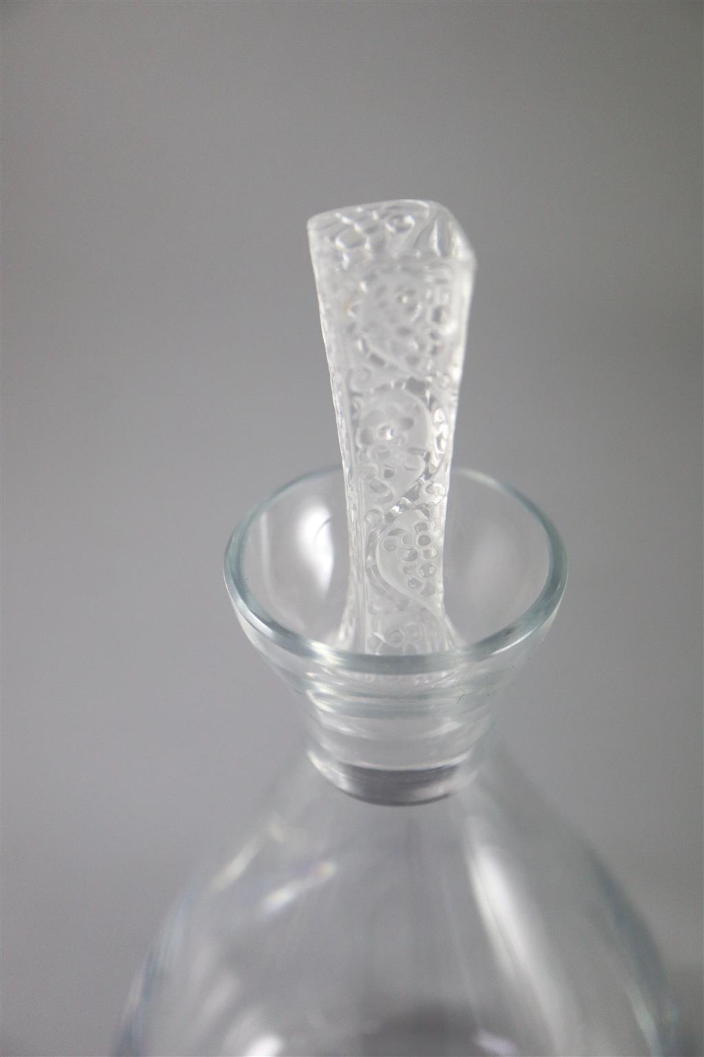 René Lalique. A Phalsbourg pattern glass decanter and two glasses, no.5057/505?, designed in 1924, 24 and 15.5cm high